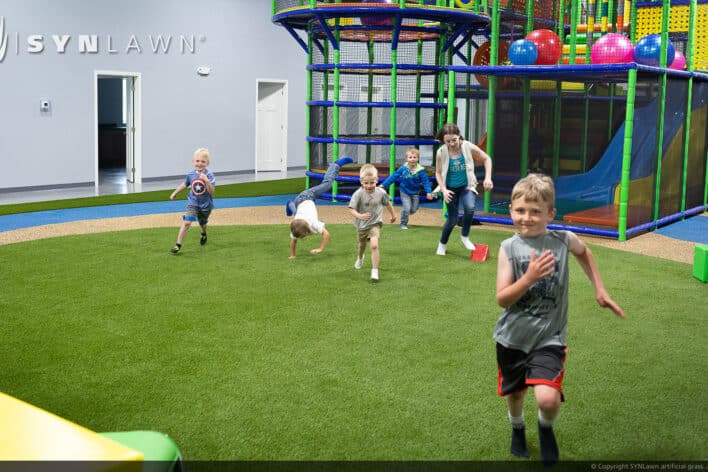 SYNLawn Des Moines IA play run wild indoor playground grass