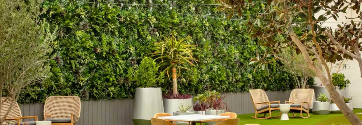 Commercial artificial living wall seating area